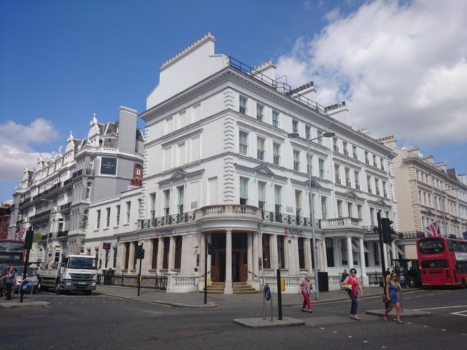 White stucco corner building on Harrington Road, South Kensington